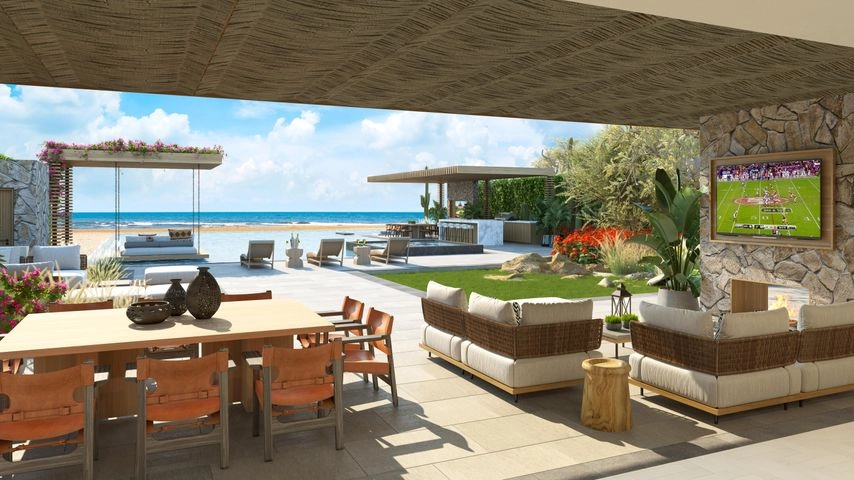 Rendering of a St. Regis villa terrace with dining, lounge and the beach beyond