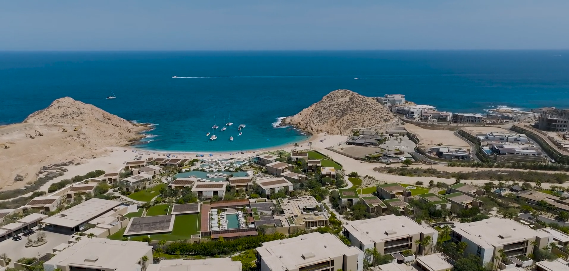Aerial view of Santa Maria Bay with Montage Los Cabos and the residences on the hillside