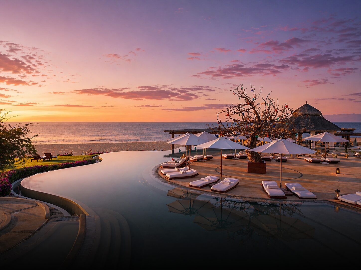 Infinity pool and beach terrace at Las Ventanas al Paraíso at sunset