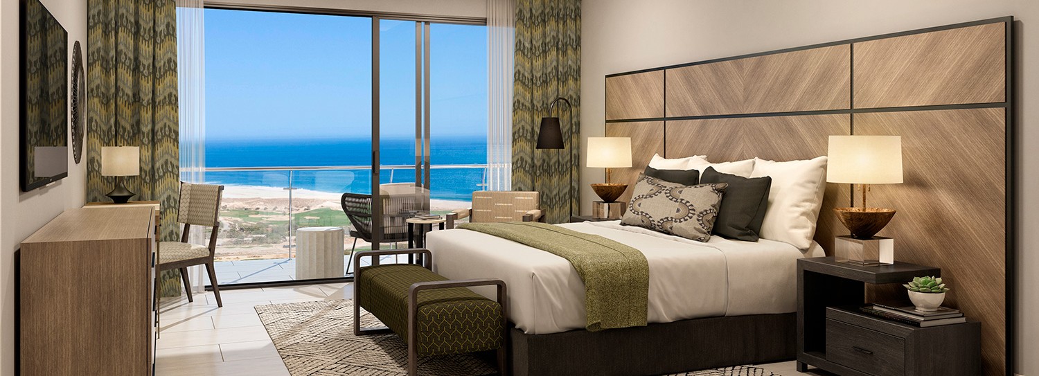Bedroom of an Alvar residence at Quivira opening to a terrace over the beach