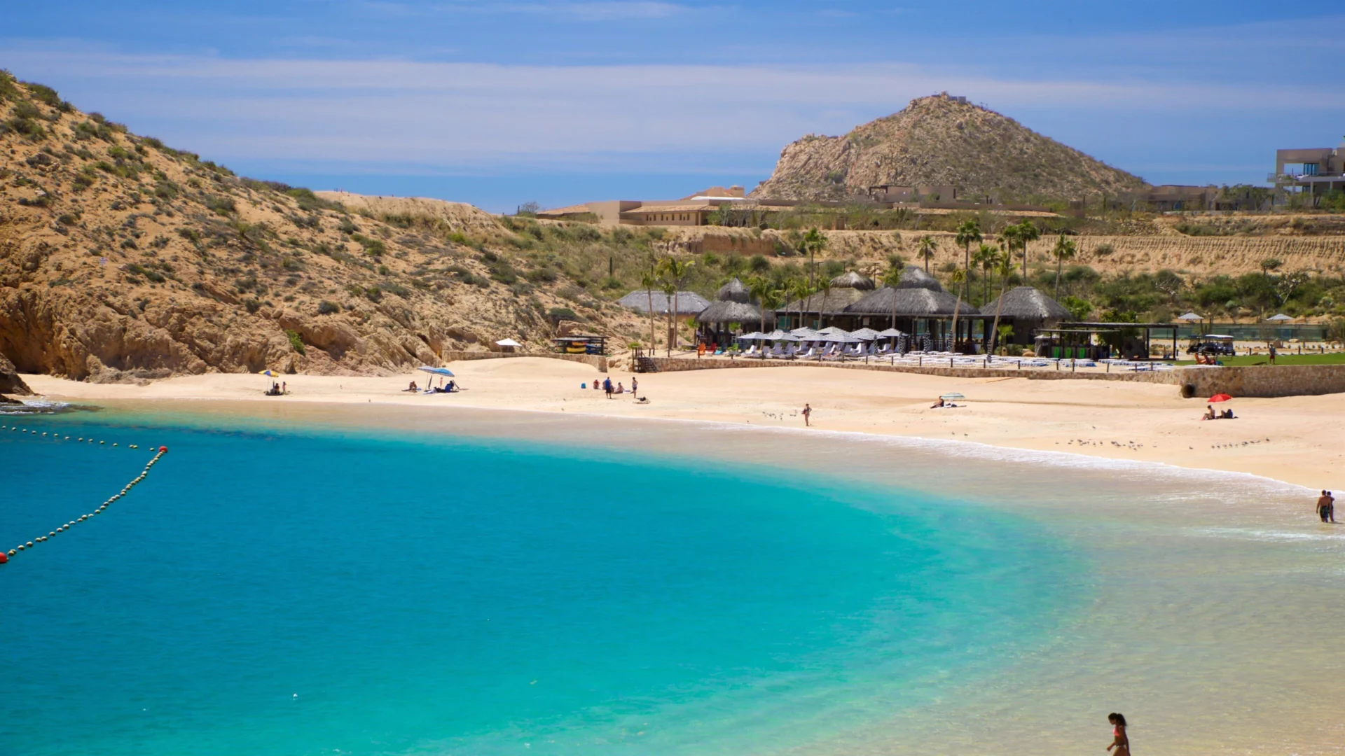 Swimmable beach communities Los Cabos luxury beachfront real estate
