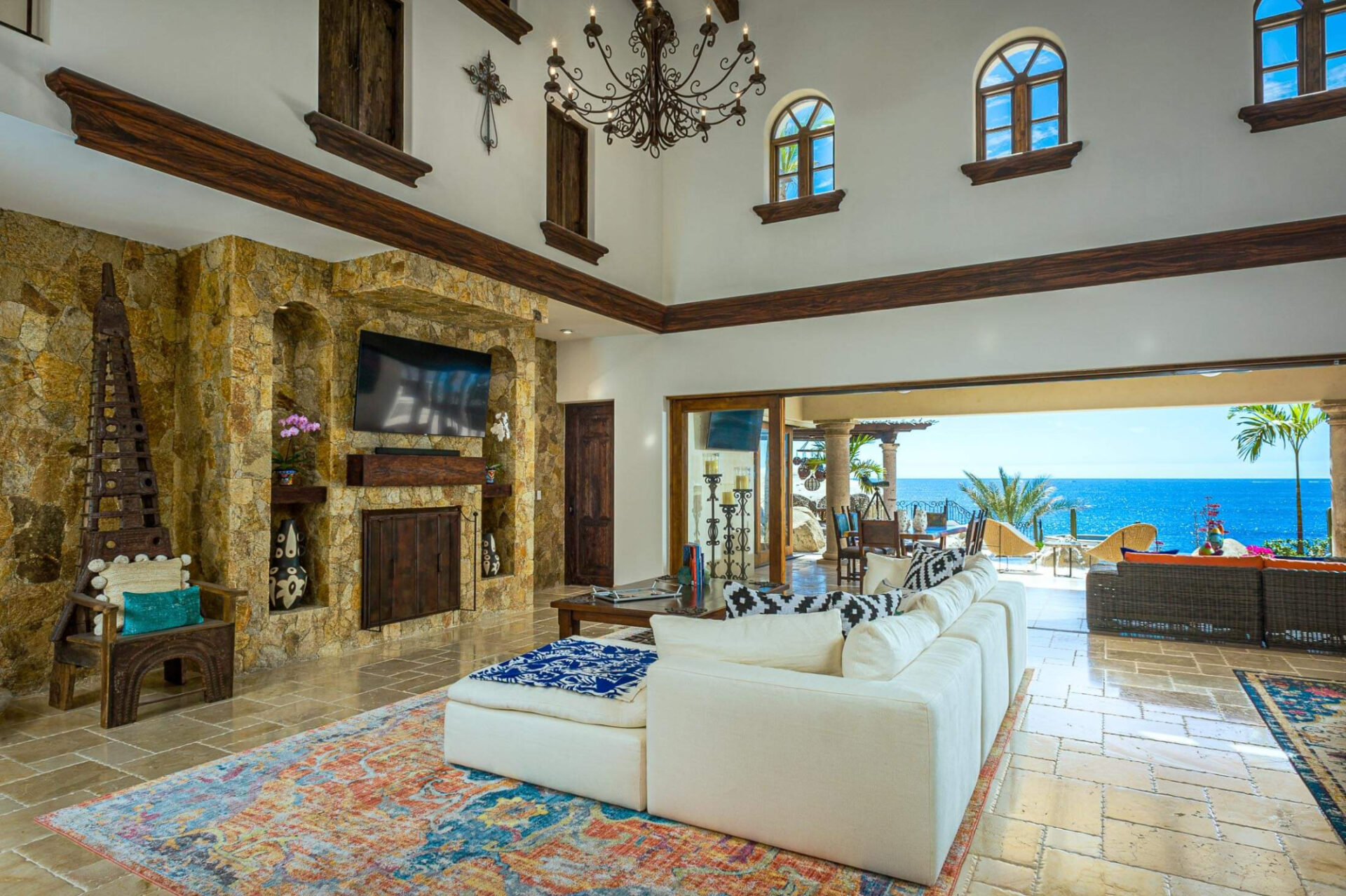 Great room of a Punta Ballena villa opening to the terrace and the Sea of Cortez