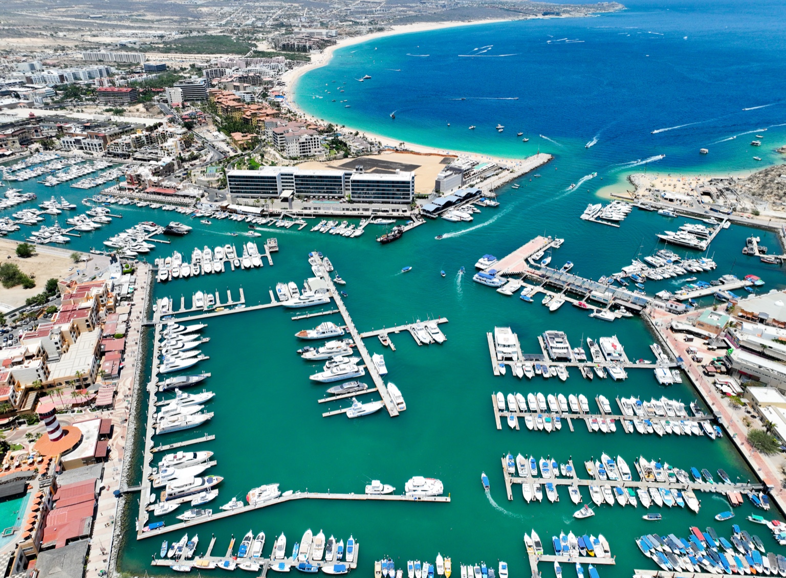 Cabo San Lucas marina and beachfront view in Los Cabos real estate market