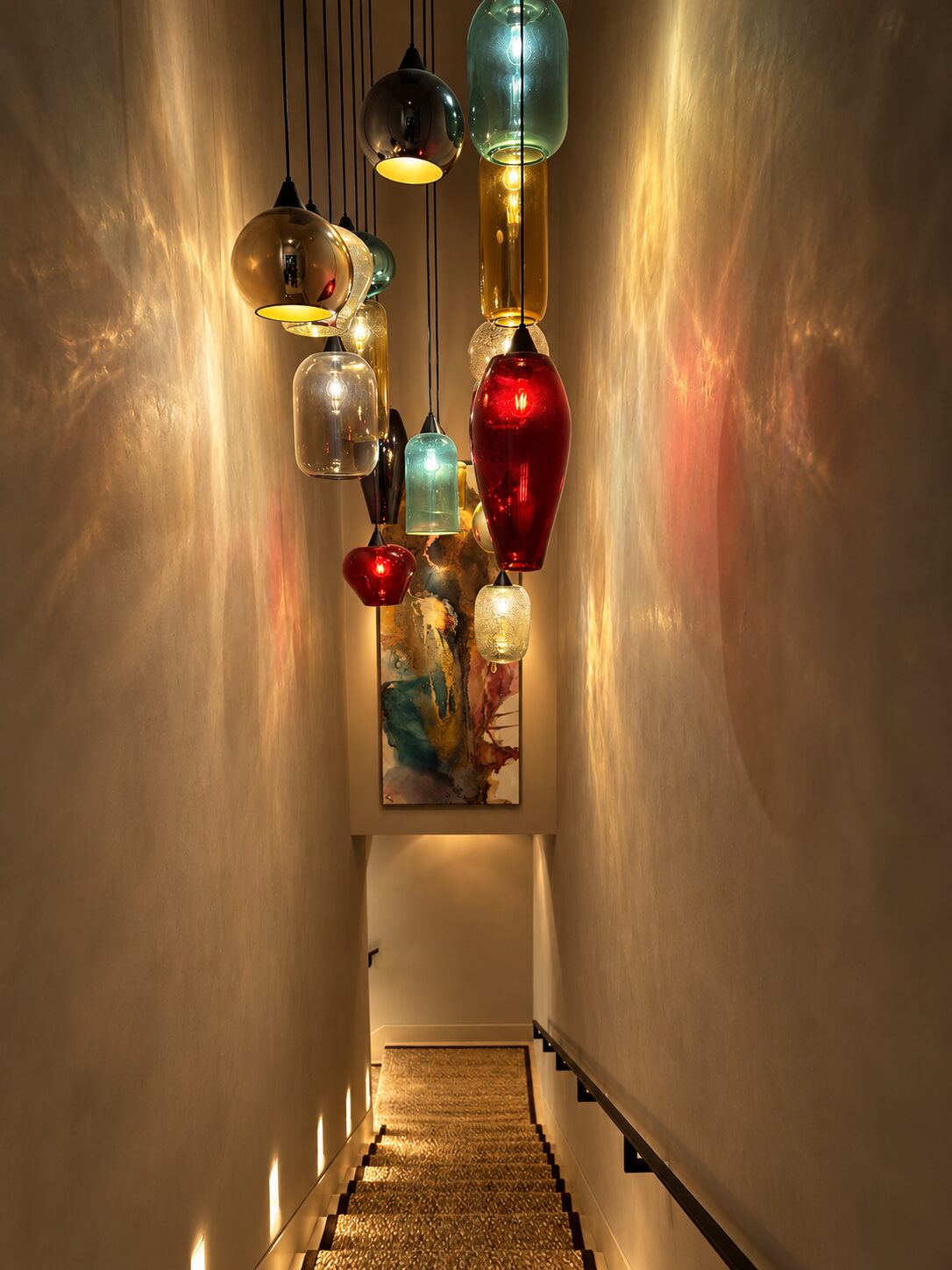 Guest bathroom in a Maravilla home with brass mirrors, Moroccan lanterns and patterned tile