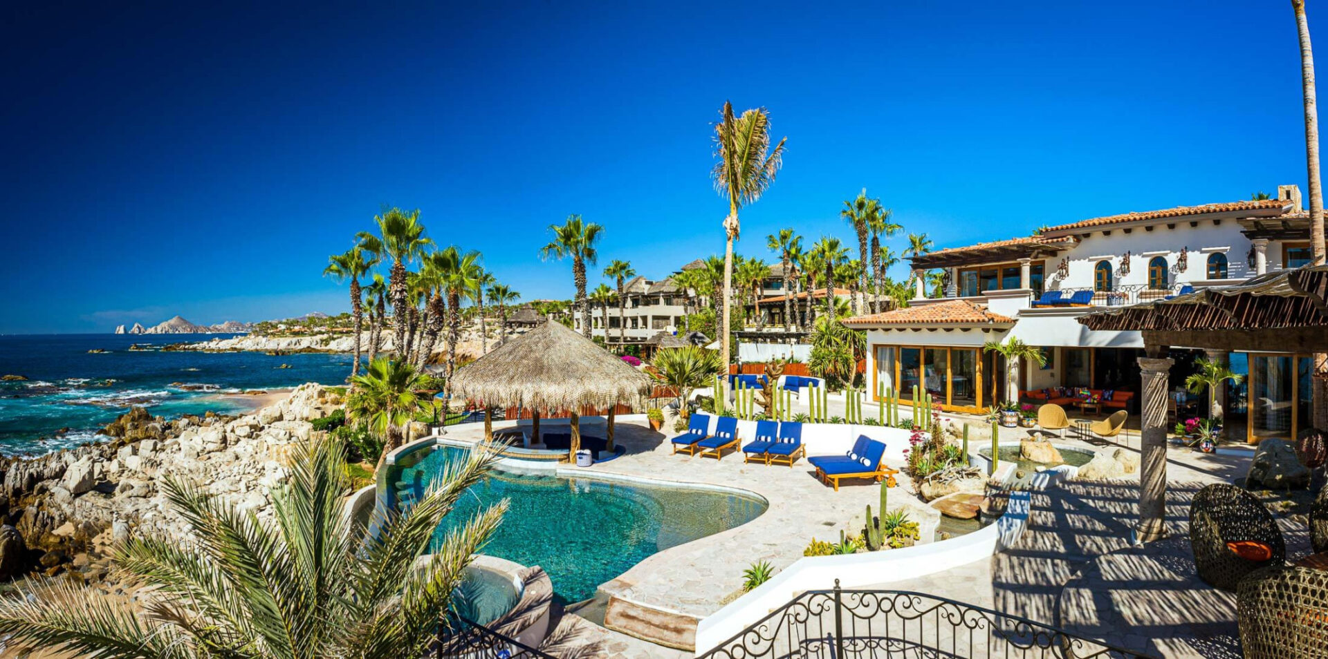 Oceanfront villa in Punta Ballena with its pool and palapa, Land’s End on the horizon