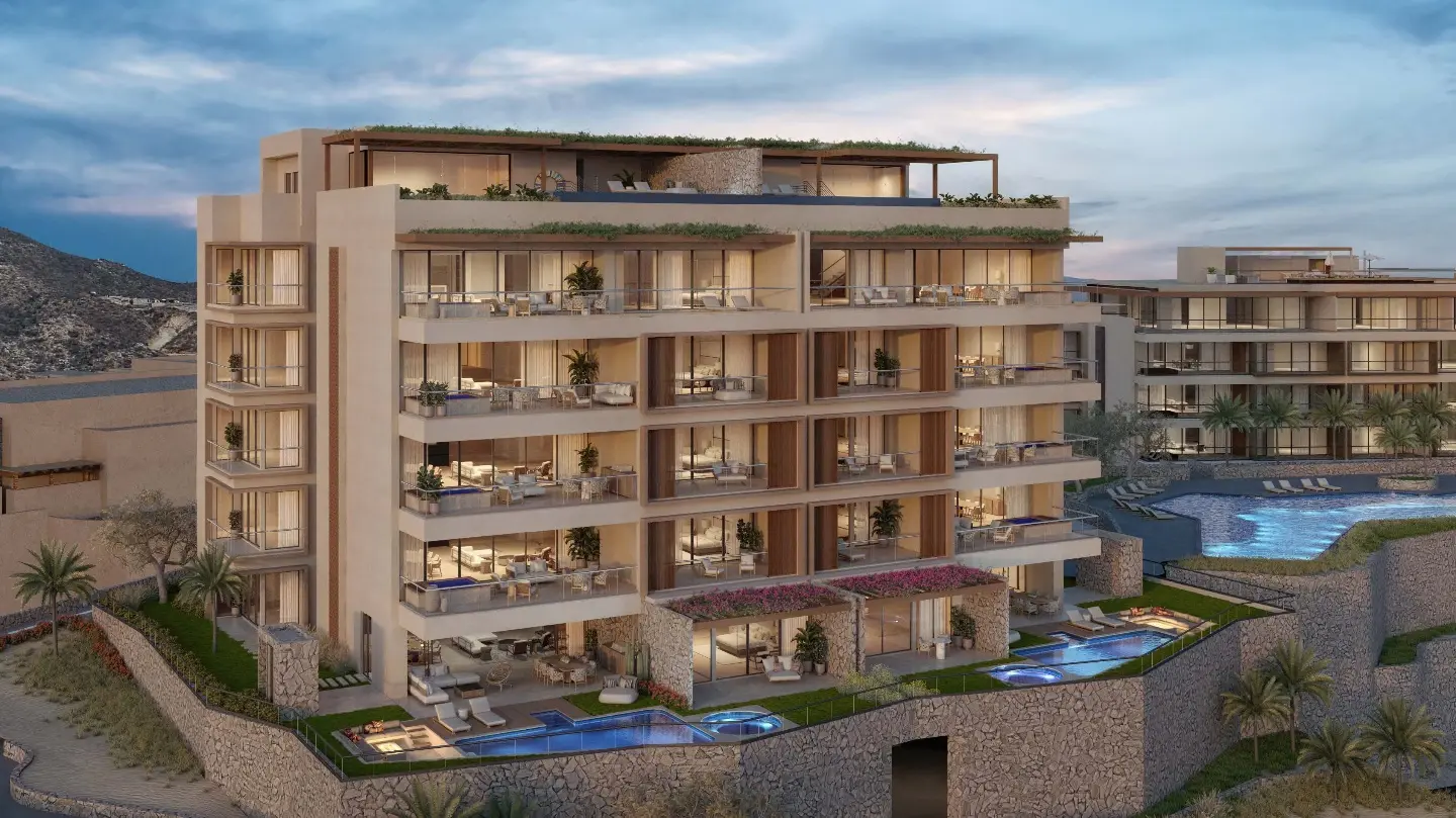 Rendering of the St. Regis condominium residences at dusk, terraces and plunge pools over the stone terraces