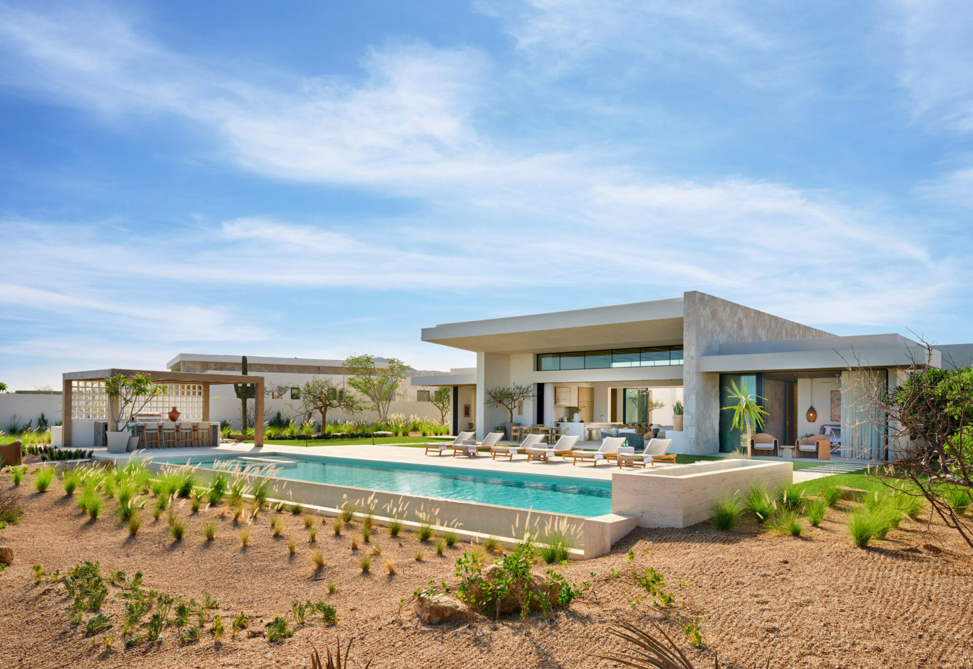 A Twin Dolphin Casita at Maravilla, single level with a long pool and desert garden
