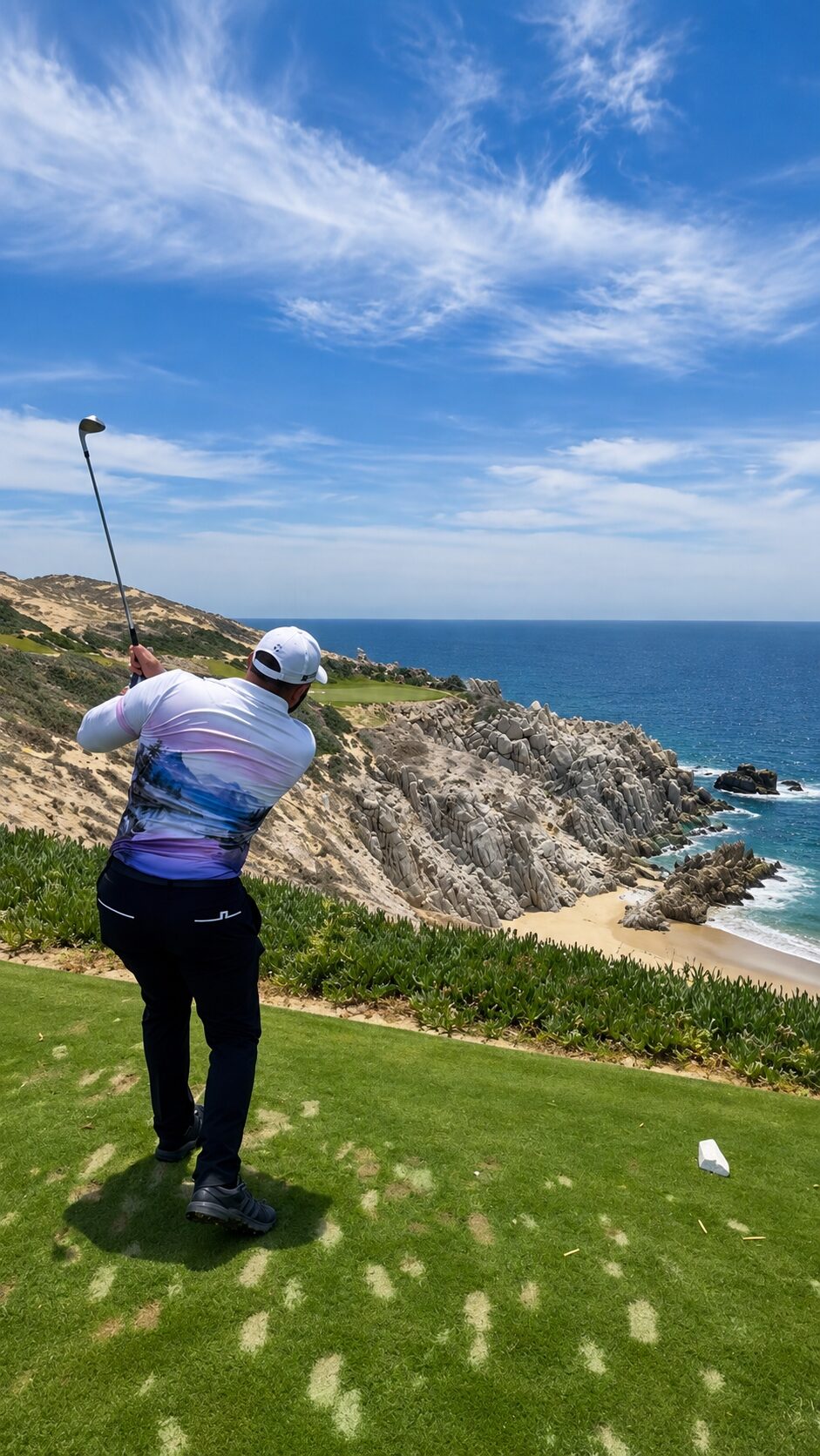 Valentino Sartev playing golf on a coastal course in Los Cabos