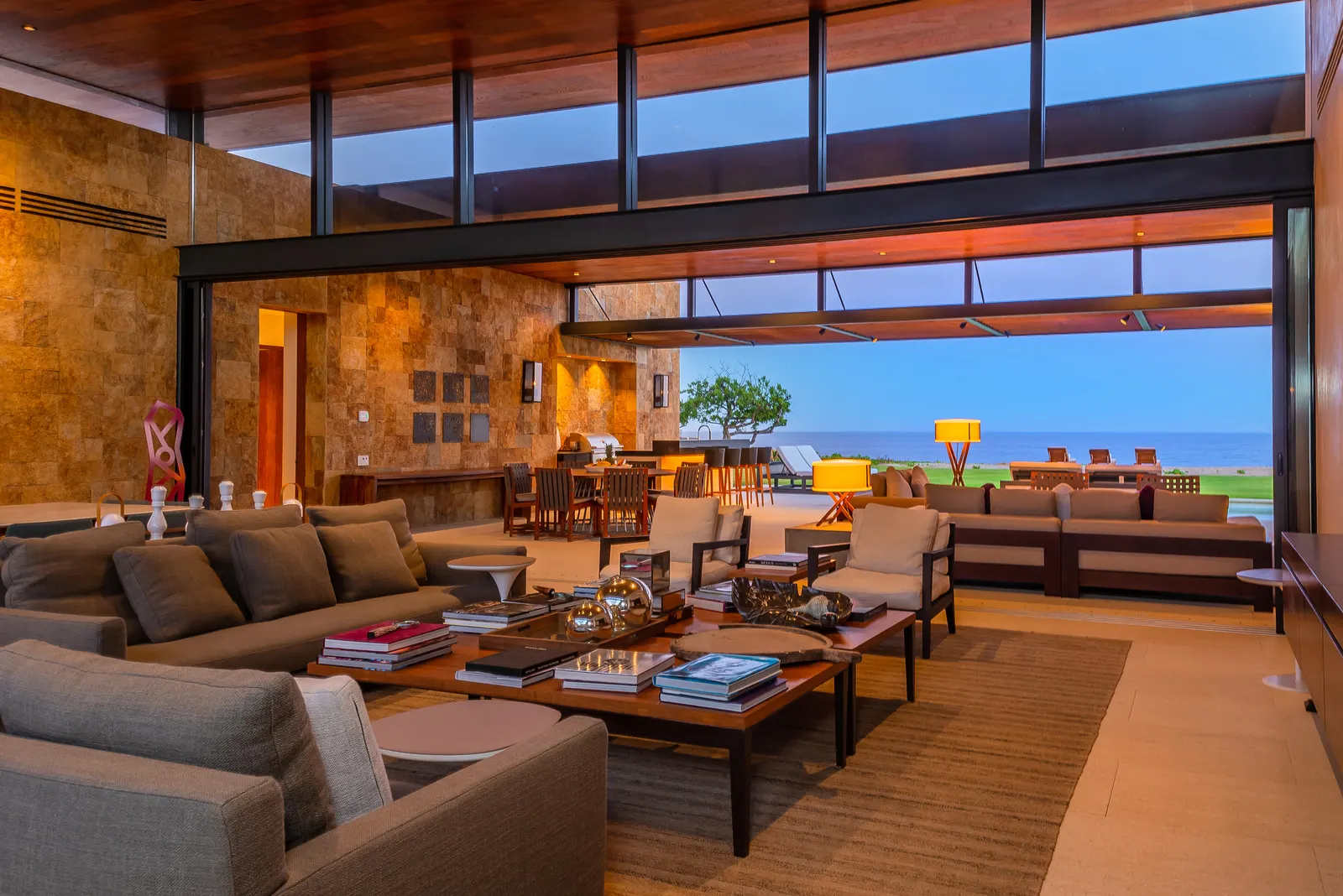 Open-plan living room of a Puerto Los Cabos villa looking out to the Sea of Cortez
