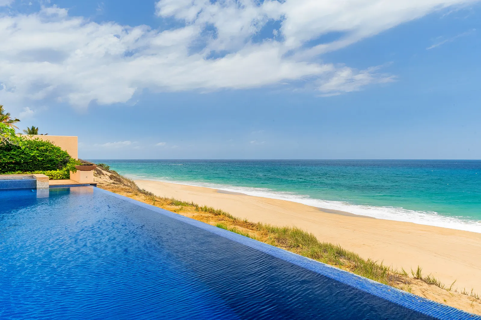 Infinity pool over the beach at a Puerto Los Cabos villa on the Sea of Cortez